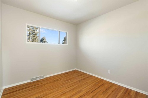 19 Carmangay Crescent Nw, Calgary, AB - Indoor Photo Showing Other Room