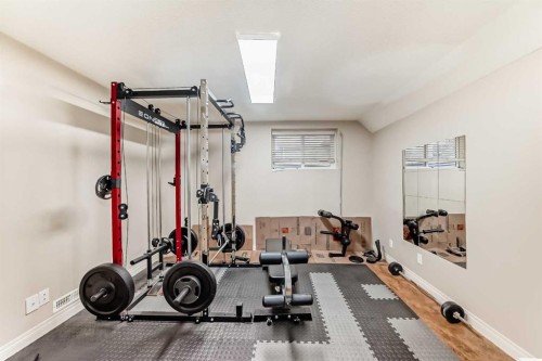 668 Scimitar Bay Nw, Calgary, AB - Indoor Photo Showing Gym Room