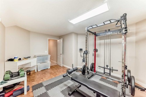668 Scimitar Bay Nw, Calgary, AB - Indoor Photo Showing Gym Room
