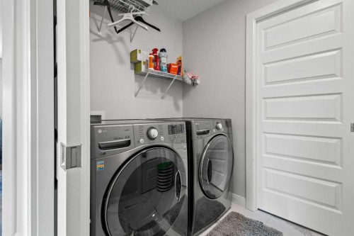 52 Evansfield Manor Nw, Calgary, AB - Indoor Photo Showing Laundry Room