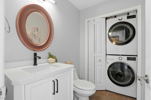 7 Bridleridge Link Sw, Calgary, AB - Indoor Photo Showing Laundry Room
