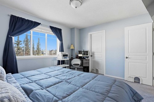 7 Bridleridge Link Sw, Calgary, AB - Indoor Photo Showing Bedroom
