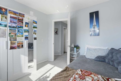 7 Bridleridge Link Sw, Calgary, AB - Indoor Photo Showing Bedroom