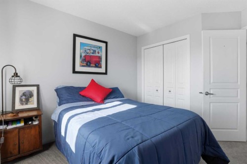7 Bridleridge Link Sw, Calgary, AB - Indoor Photo Showing Bedroom