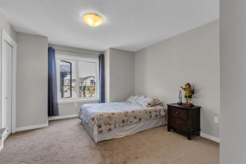 142 Red Embers Gate Ne, Calgary, AB - Indoor Photo Showing Bedroom