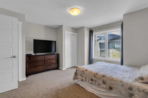 142 Red Embers Gate Ne, Calgary, AB - Indoor Photo Showing Bedroom