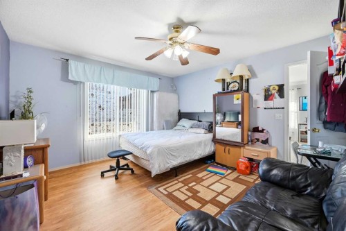 311 Saddlecreek Point Ne, Calgary, AB - Indoor Photo Showing Bedroom