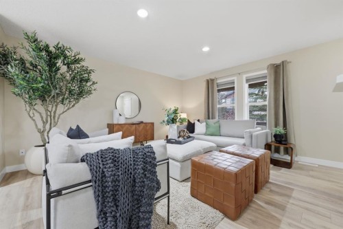 117 Panatella Park Nw, Calgary, AB - Indoor Photo Showing Living Room