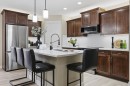 117 Panatella Park Nw, Calgary, AB  - Indoor Photo Showing Kitchen With Upgraded Kitchen 