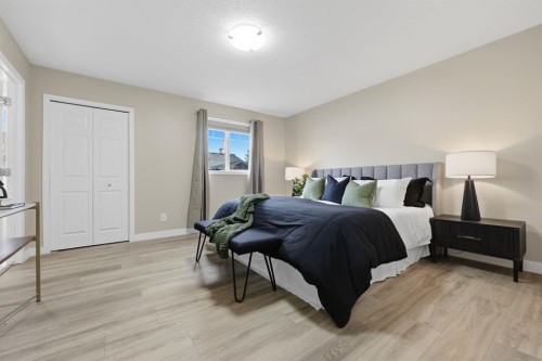 117 Panatella Park Nw, Calgary, AB - Indoor Photo Showing Bedroom