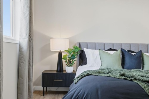 117 Panatella Park Nw, Calgary, AB - Indoor Photo Showing Bedroom