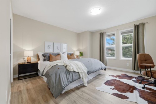 117 Panatella Park Nw, Calgary, AB - Indoor Photo Showing Bedroom