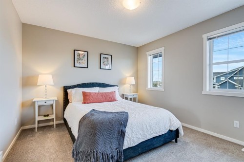 121 Marine Drive Se, Calgary, AB - Indoor Photo Showing Bedroom