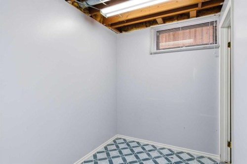 38 Springwood Crescent Se, Airdrie, AB - Indoor Photo Showing Basement