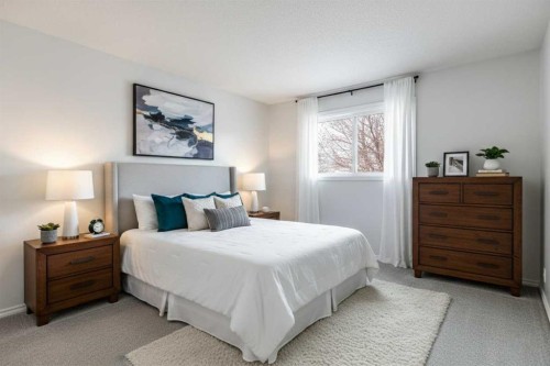 38 Springwood Crescent Se, Airdrie, AB - Indoor Photo Showing Bedroom