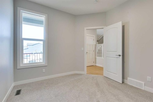 157 Wolf Hollow Drive Se, Calgary, AB - Indoor Photo Showing Other Room