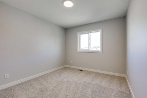 157 Wolf Hollow Drive Se, Calgary, AB - Indoor Photo Showing Other Room