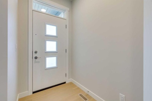 157 Wolf Hollow Drive Se, Calgary, AB - Indoor Photo Showing Other Room