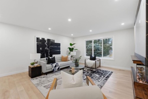 11039 Brae Road Sw, Calgary, AB - Indoor Photo Showing Living Room