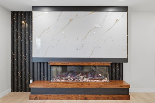 11039 Brae Road Sw, Calgary, AB - Indoor Photo Showing Living Room With Fireplace