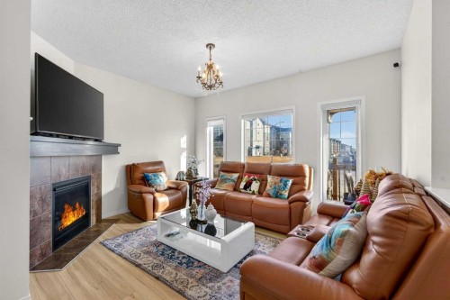257 Skyview Ranch Boulevard Ne, Calgary, AB - Indoor Photo Showing Living Room With Fireplace