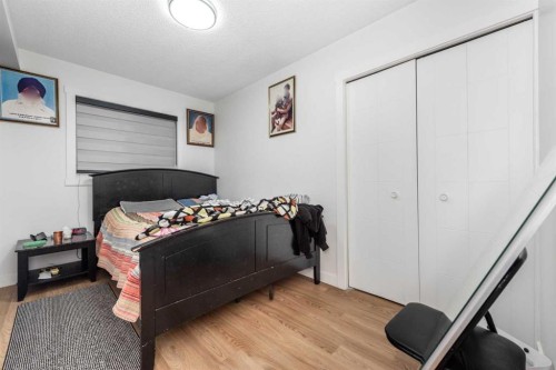 133 Woodbrook Road Sw, Calgary, AB - Indoor Photo Showing Bedroom