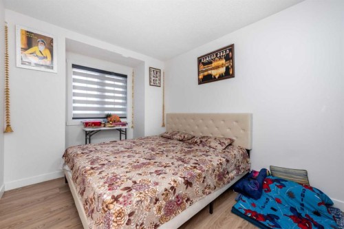 133 Woodbrook Road Sw, Calgary, AB - Indoor Photo Showing Bedroom