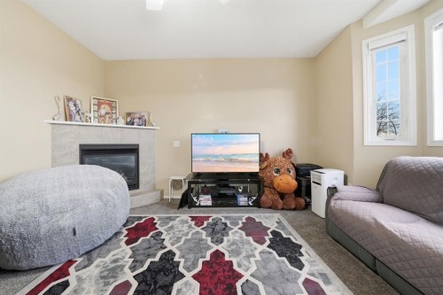 131 San Fernando Crescent Ne, Calgary, AB - Indoor With Fireplace