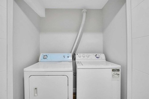 23 Shawmeadows Place Sw, Calgary, AB - Indoor Photo Showing Laundry Room