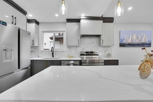 23 Shawmeadows Place Sw, Calgary, AB - Indoor Photo Showing Kitchen With Stainless Steel Kitchen With Upgraded Kitchen