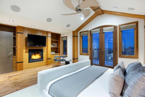 738 Crescent Road Nw, Calgary, AB - Indoor Photo Showing Bedroom With Fireplace