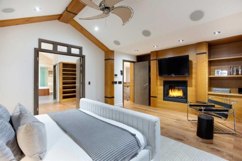 738 Crescent Road Nw, Calgary, AB - Indoor Photo Showing Bedroom With Fireplace