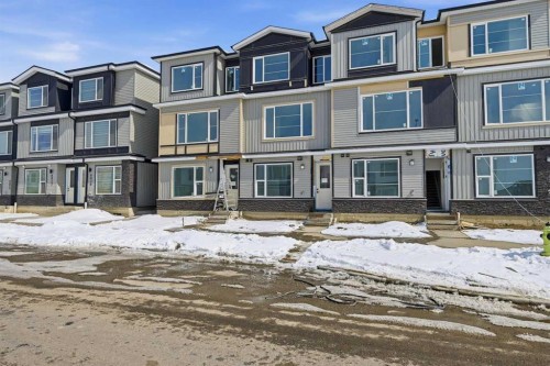 8814 48 Street Ne, Calgary, AB - Outdoor With Balcony With Facade