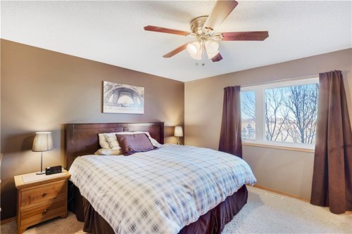 272210 Range Road 291 Ne, Airdrie, AB - Indoor Photo Showing Bedroom