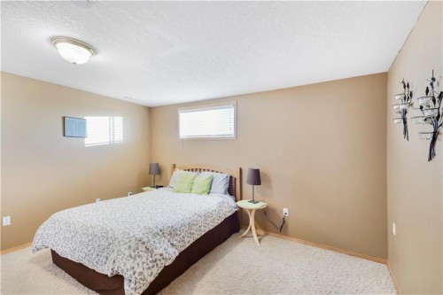 272210 Range Road 291 Ne, Airdrie, AB - Indoor Photo Showing Bedroom