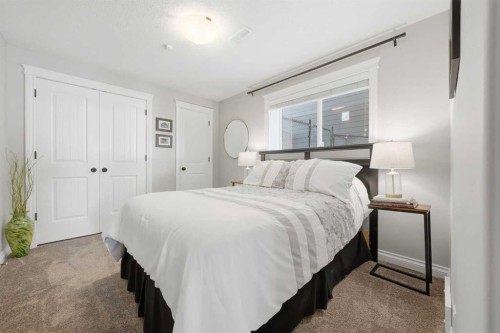1053 Hillcrest Manor Estates, Strathmore, AB - Indoor Photo Showing Bedroom