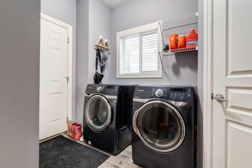 107 Evansbrooke Manor Nw, Calgary, AB - Indoor Photo Showing Laundry Room