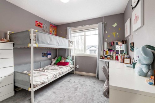 107 Evansbrooke Manor Nw, Calgary, AB - Indoor Photo Showing Bedroom