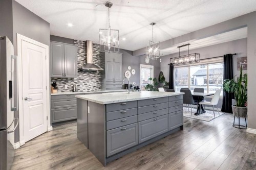 107 Evansbrooke Manor Nw, Calgary, AB - Indoor Photo Showing Kitchen With Upgraded Kitchen