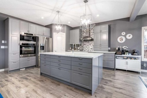 107 Evansbrooke Manor Nw, Calgary, AB - Indoor Photo Showing Kitchen With Upgraded Kitchen