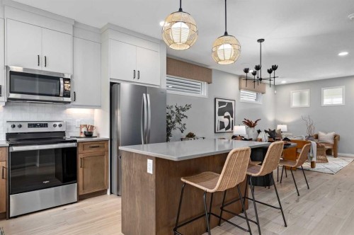 91 Huxland Road Ne, Calgary, AB - Indoor Photo Showing Kitchen With Upgraded Kitchen