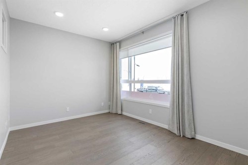 91 Huxland Road Ne, Calgary, AB - Indoor Photo Showing Other Room