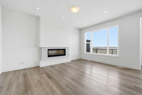 276 Belvedere Drive, Calgary, AB - Indoor Photo Showing Living Room With Fireplace