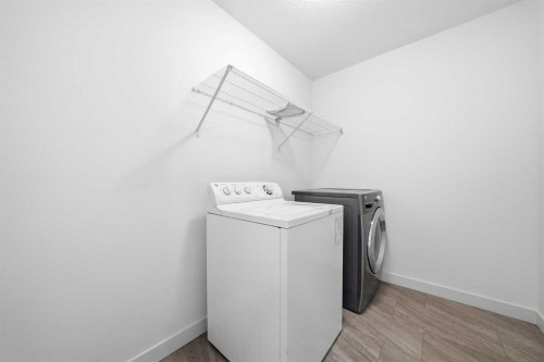 276 Belvedere Drive, Calgary, AB - Indoor Photo Showing Laundry Room