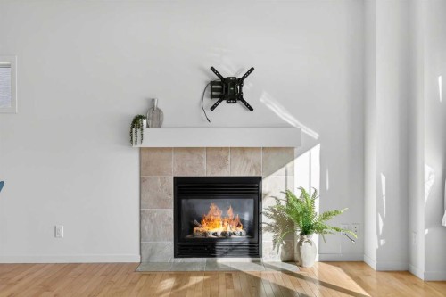 345 Mahogany Boulevard Se, Calgary, AB - Indoor Photo Showing Living Room With Fireplace