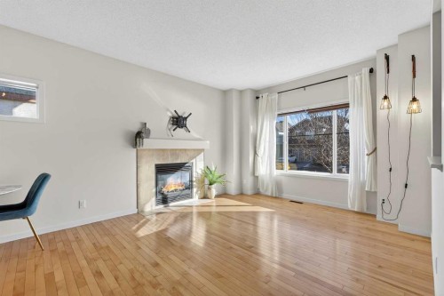 345 Mahogany Boulevard Se, Calgary, AB - Indoor Photo Showing Other Room With Fireplace