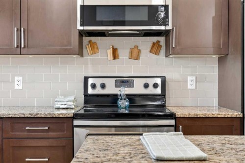 345 Mahogany Boulevard Se, Calgary, AB - Indoor Photo Showing Kitchen With Upgraded Kitchen