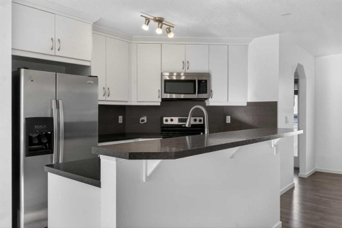 512 Evanston Drive Nw, Calgary, AB - Indoor Photo Showing Kitchen With Upgraded Kitchen