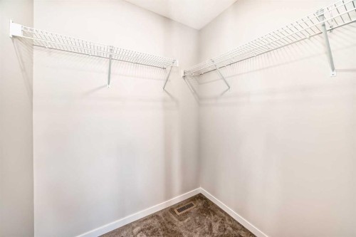 535 Tekarra Drive Nw, Calgary, AB - Indoor With Storage