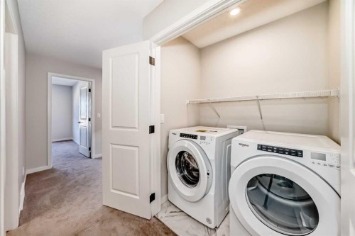 535 Tekarra Drive Nw, Calgary, AB - Indoor Photo Showing Laundry Room